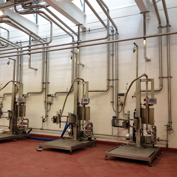 Three FT-100 Liquid Filling Systems Ready to Fill Drums, Pails, and IBC's